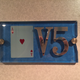 The Ace of Hearts marks one cabin door.
